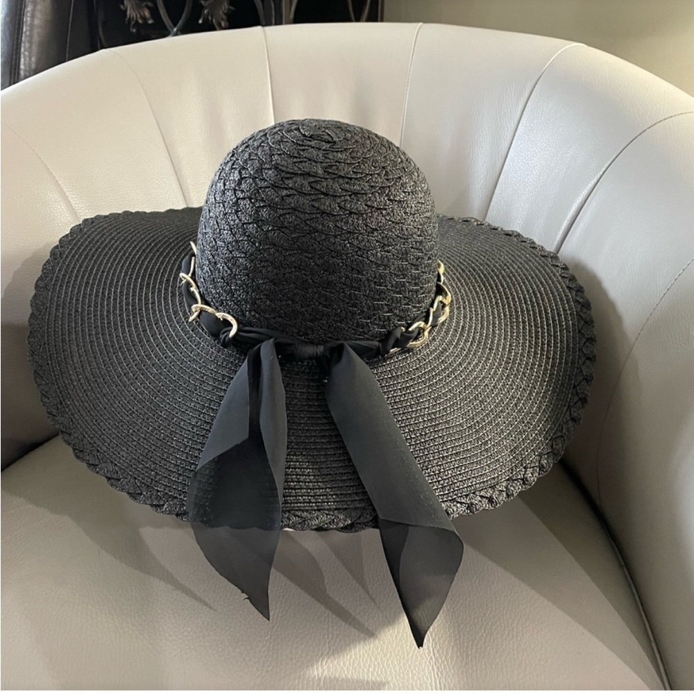 Marcus Adler New York black floppy hat with gold chain and sheer scarf accent